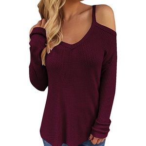 Deep burgundy cold shoulder top. Brand new and unworn with tags attached.